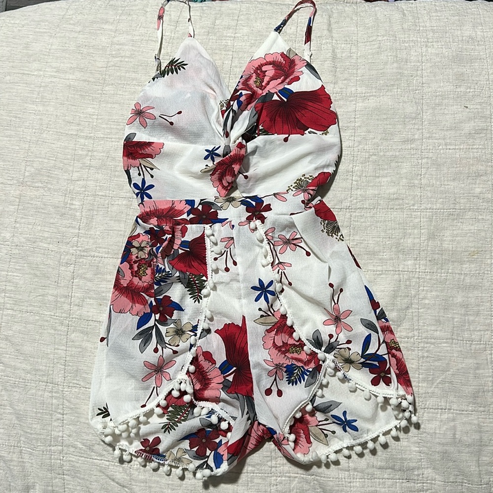 BRAND NEW Open back Romper. Size S